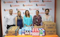 Donación de leche a beneficio de la Escuela El Bijagual